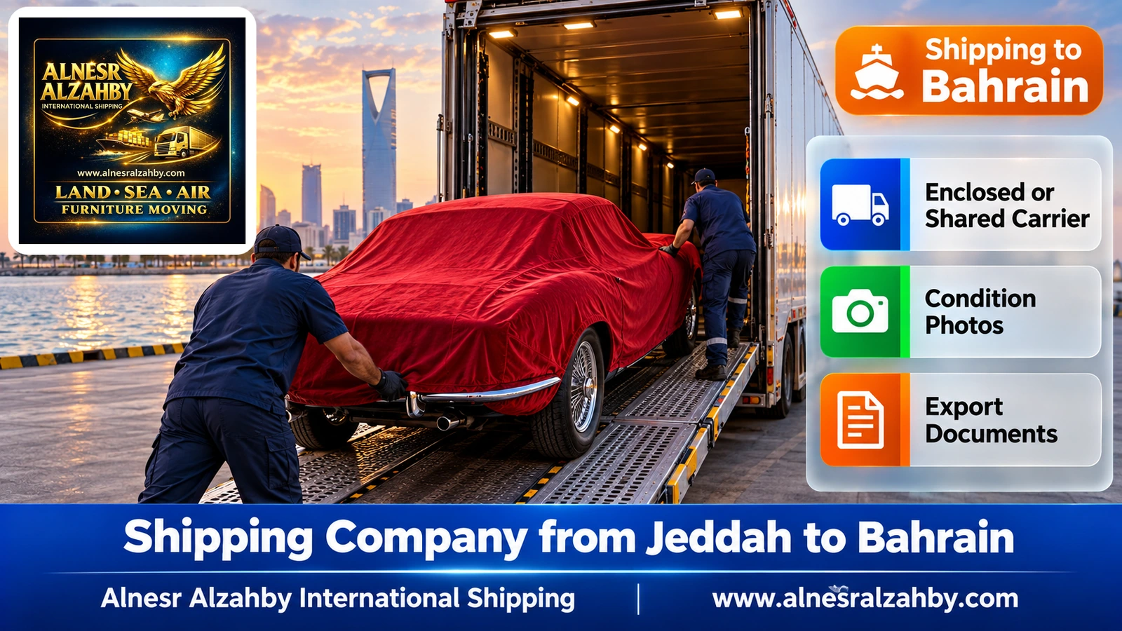 A classic car under a deep red protective cover being loaded into an enclosed car carrier in Jeddah