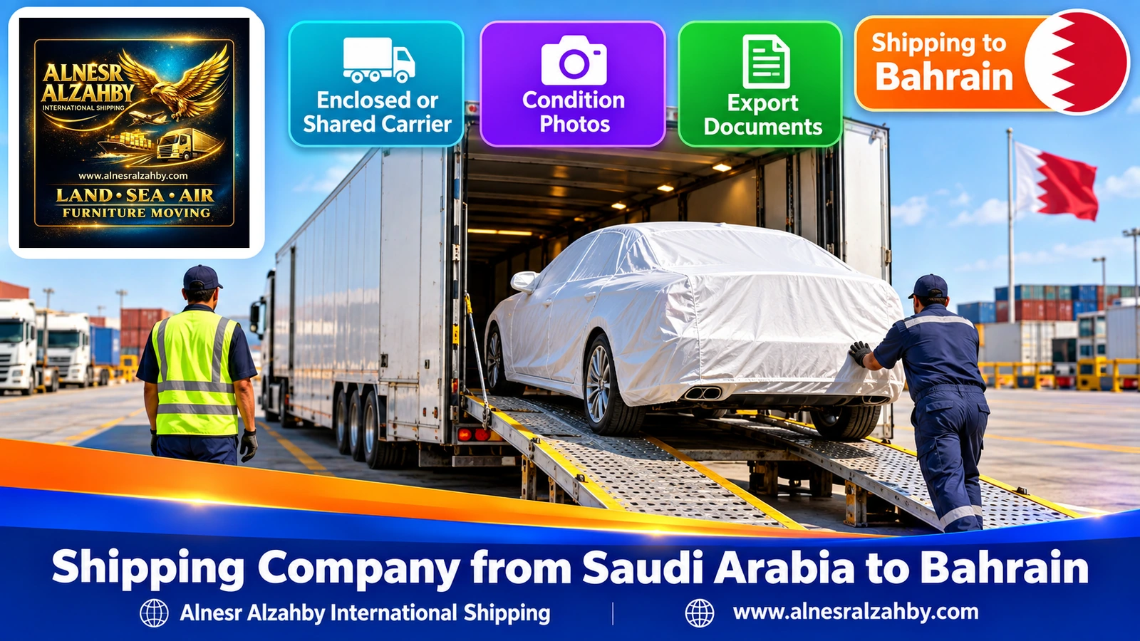 A sedan under a pearl-white protective cover being loaded into an enclosed car carrier in an organised yard