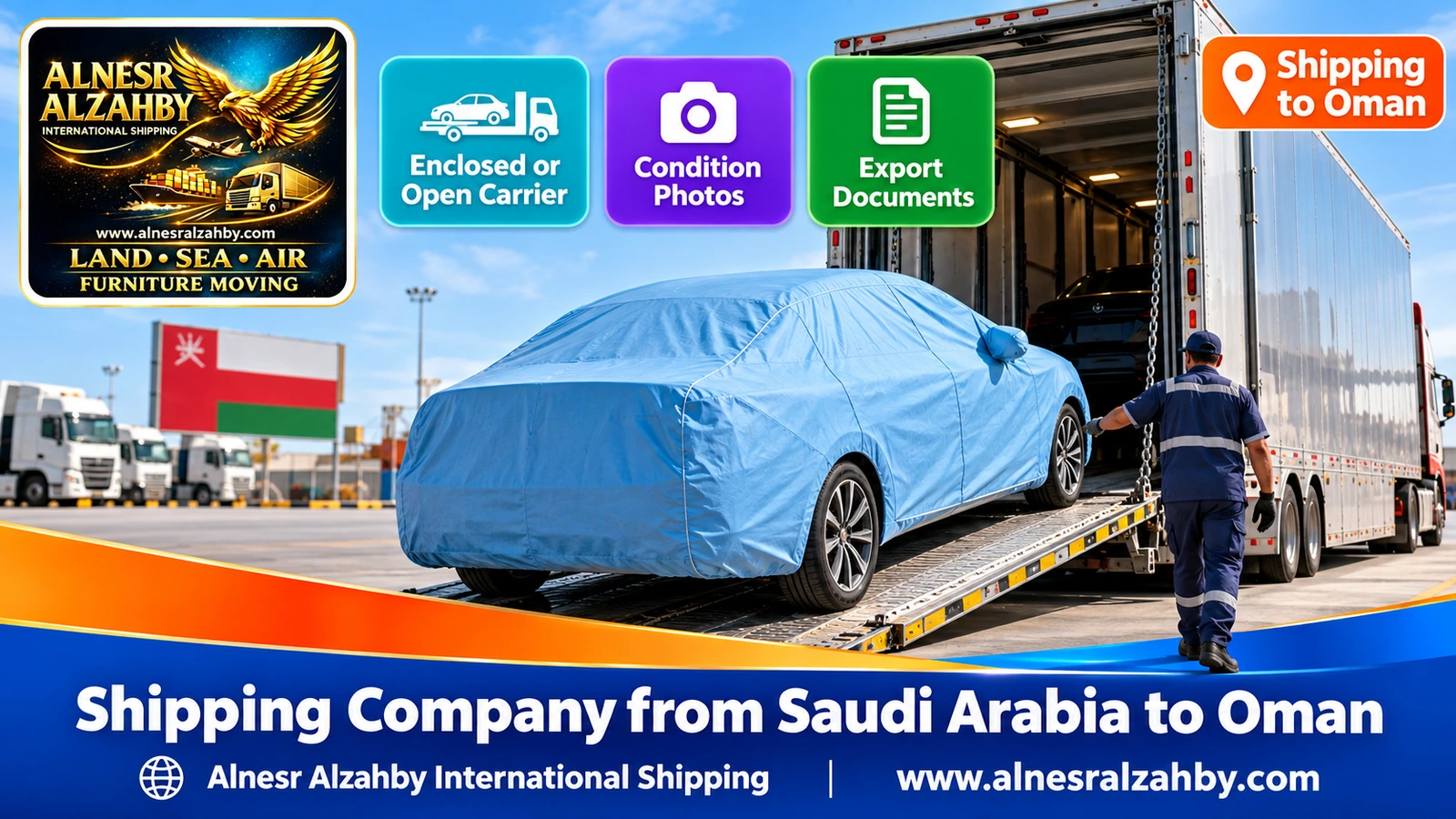 A sedan under a light blue protective cover being loaded into an enclosed car carrier in an organised yard